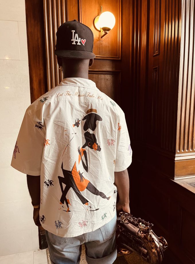 "LET THE MUSIC TAKE ME" BUTTON UP.