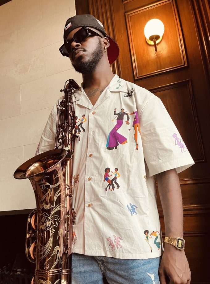 "LET THE MUSIC TAKE ME" BUTTON UP.