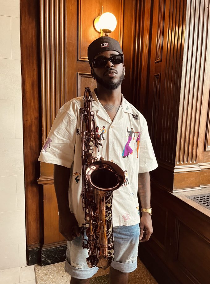 "LET THE MUSIC TAKE ME" BUTTON UP.