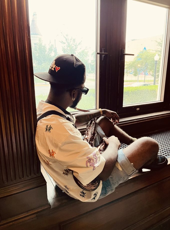 "LET THE MUSIC TAKE ME" BUTTON UP.